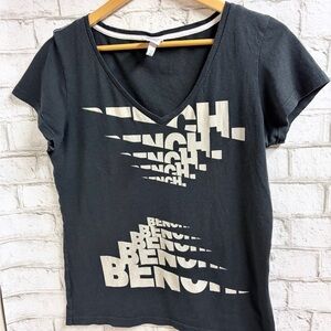 Bench Black V‑Neck Tee with Cream Logo Graphic
